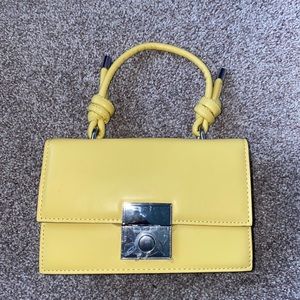 Never used. Can be used as crossbody or Handbag